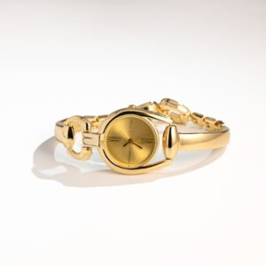 Stylish little haute couture vintage button bracelet watch.